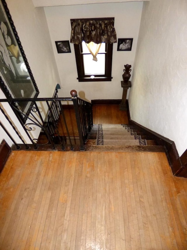 21 Woodland Ave, Elgin, IL 60123 - stairway with wood-type flooring and baseboards