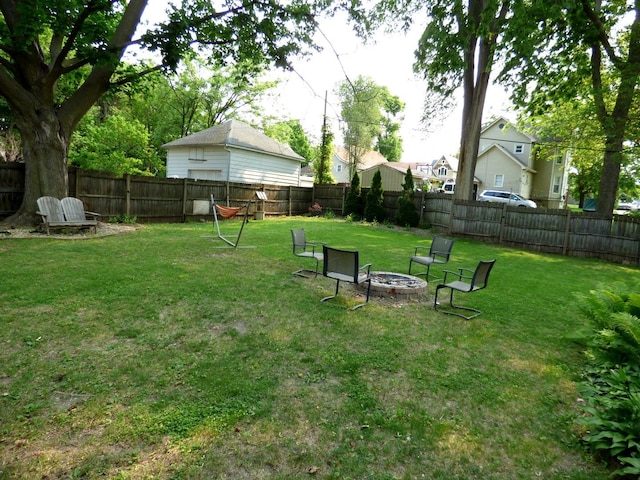21 Woodland Ave, Elgin, IL 60123 - view of yard featuring a fire pit