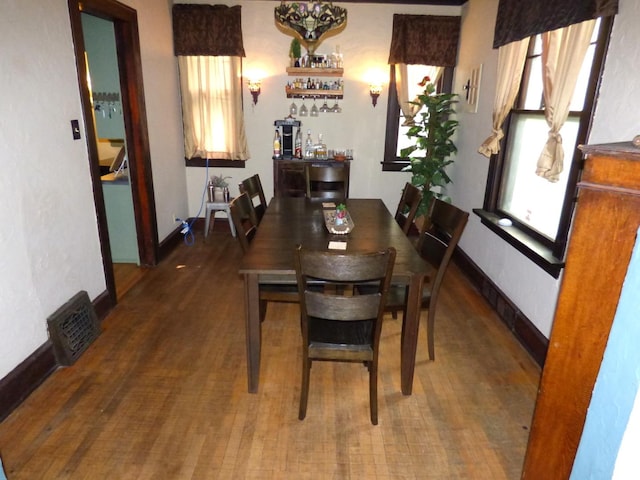 21 Woodland Ave, Elgin, IL 60123 - dining area featuring baseboards
