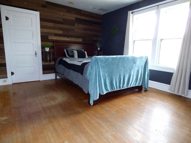 21 Woodland Ave, Elgin, IL 60123 - bedroom with hardwood / wood-style flooring and baseboards