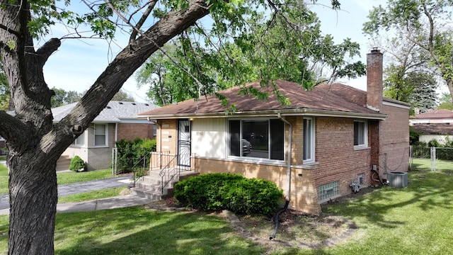 15965 Debbie Ln, South Holland, IL 60473 - single story home with brick siding, a chimney, central AC, and roof with shingles