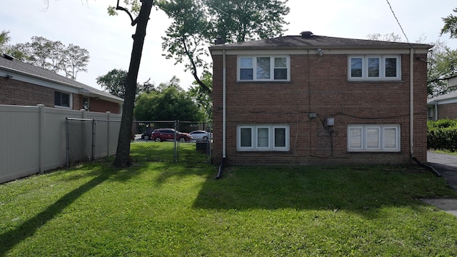 15965 Debbie Ln, South Holland, IL 60473 - view of property exterior featuring brick siding