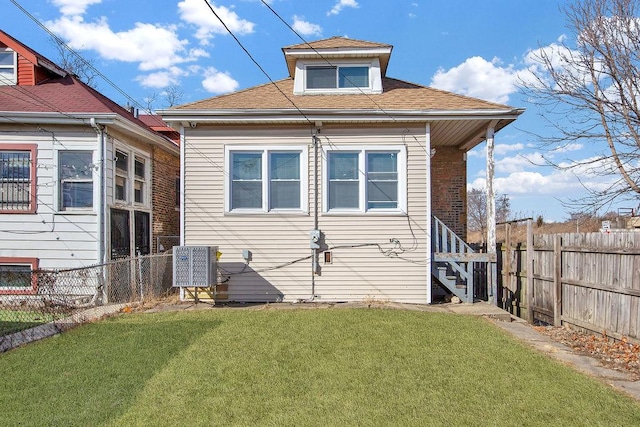 7501 S Aberdeen Ave, Chicago, IL 60620 - rear view of property featuring roof with shingles, stairway, and cooling unit