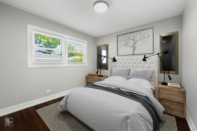 1166 S Highland Ave, Arlington Heights, IL 60005 - bedroom with baseboards and dark wood-type flooring