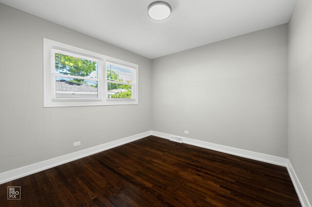 1166 S Highland Ave, Arlington Heights, IL 60005 - spare room with baseboards and dark wood finished floors