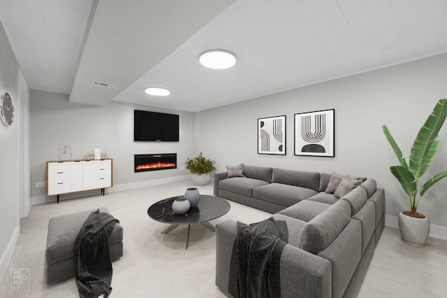 1166 S Highland Ave, Arlington Heights, IL 60005 - living area with a glass covered fireplace, carpet flooring, and baseboards