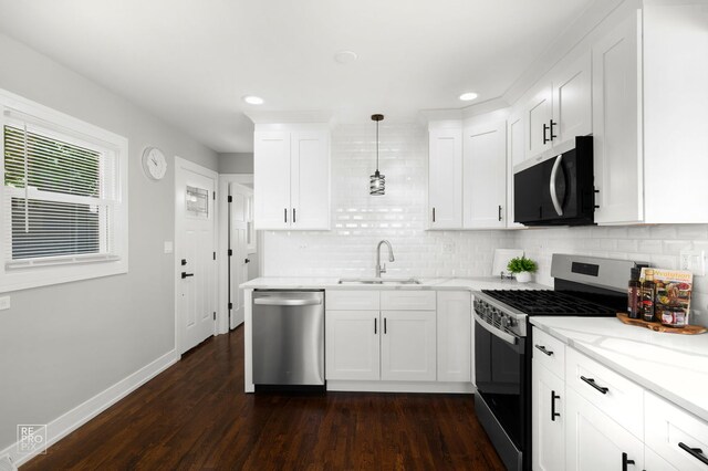 1166 S Highland Ave, Arlington Heights, IL 60005 - kitchen with stainless steel appliances, a sink, tasteful backsplash, dark wood finished floors, and recessed lighting