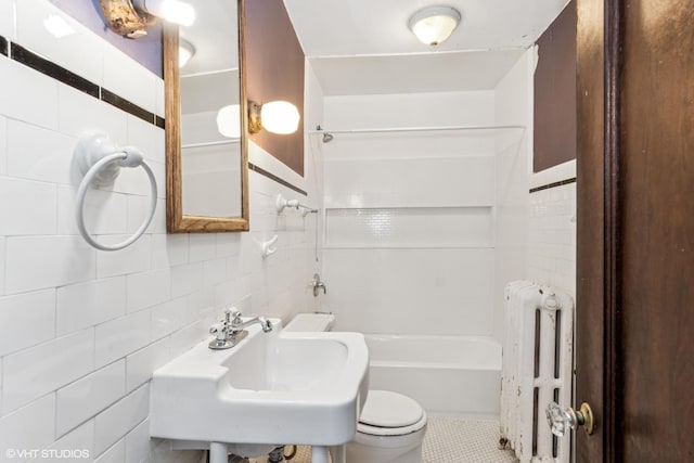 1005 Division St, Lisle, IL 60532 - bathroom with tile walls, radiator, a sink, toilet, and shower / bath combination