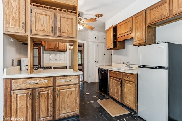 1005 Division St, Lisle, IL 60532 - kitchen featuring freestanding refrigerator, black dishwasher, a sink, tasteful backsplash, and light countertops