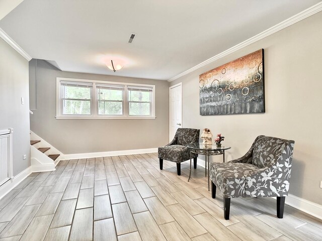 9113 Elm Cir, Hickory Hills, IL 60457 - sitting room with crown molding, wood finish floors, stairs, and baseboards