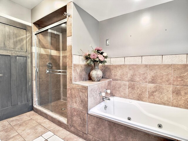 9113 Elm Cir, Hickory Hills, IL 60457 - full bath with a whirlpool tub, a stall shower, tile patterned flooring, and tile walls