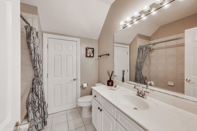 2013 Valor Ct, Glenview, IL 60026 - bathroom with vanity, tile patterned flooring, toilet, curtained shower, and vaulted ceiling