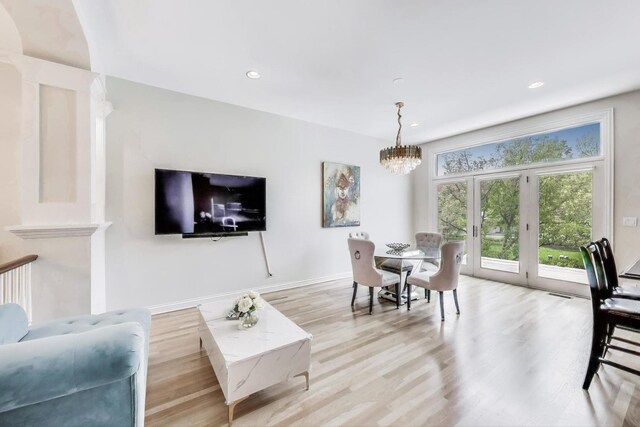 2013 Valor Ct, Glenview, IL 60026 - living area featuring a chandelier, light wood-style flooring, and recessed lighting