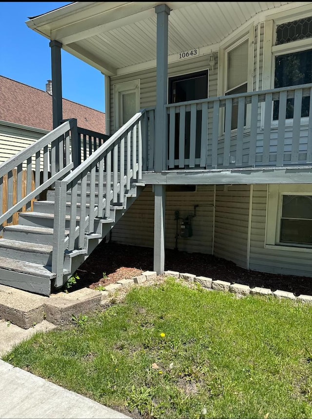 10643 S Calhoun Ave, Chicago, IL 60617 - view of home's exterior featuring covered porch and stairway