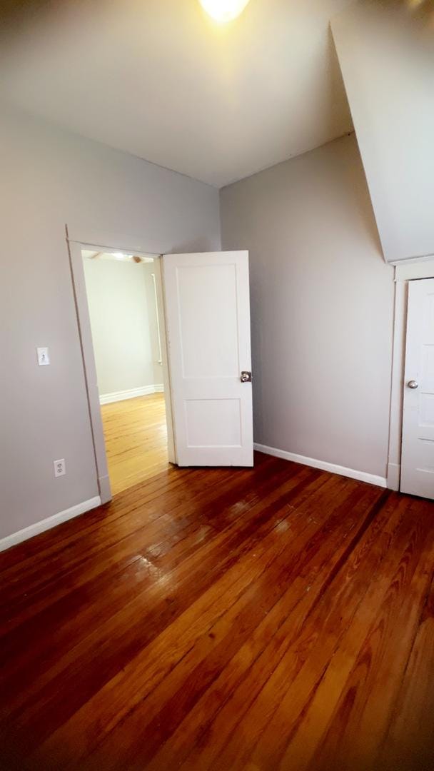 10643 S Calhoun Ave, Chicago, IL 60617 - bonus room with baseboards and wood finished floors