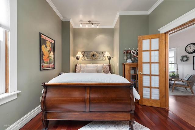 17918 Ridgewood Ave, Lansing, IL 60438 - bedroom featuring wood finished floors, ornamental molding, track lighting, and baseboards