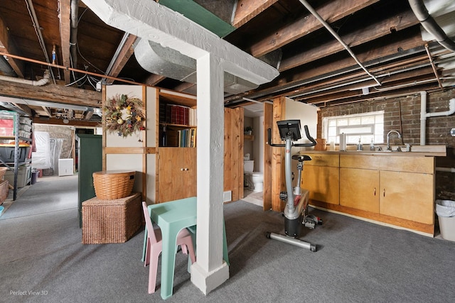 17918 Ridgewood Ave, Lansing, IL 60438 - below grade area featuring a sink and brick wall