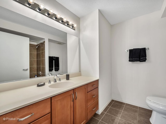 9715 Woods Dr Unit 1104, Skokie, IL 60077 - full bathroom with vanity, toilet, tile patterned floors, a shower, and baseboards