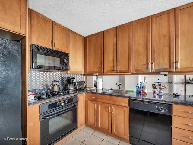 9715 Woods Dr Unit 1104, Skokie, IL 60077 - kitchen with black appliances, a sink, light tile patterned flooring, decorative backsplash, and dark stone counters