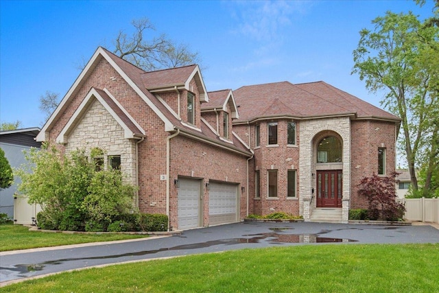 3 Crestview Ter, Buffalo Grove, IL 60089 - view of front of property featuring driveway, stone siding, and brick siding