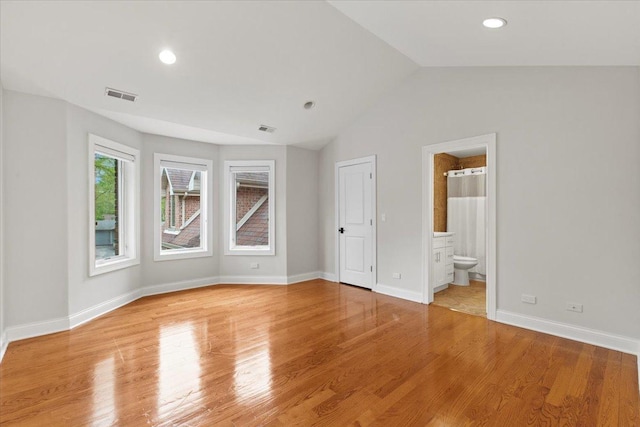 3 Crestview Ter, Buffalo Grove, IL 60089 - unfurnished bedroom with vaulted ceiling, light wood-style floors, baseboards, recessed lighting, and ensuite bath
