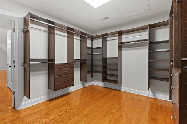 3 Crestview Ter, Buffalo Grove, IL 60089 - walk in closet with light wood finished floors and attic access