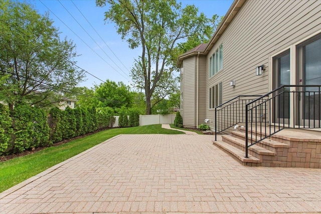 3 Crestview Ter, Buffalo Grove, IL 60089 - fenced backyard with a patio
