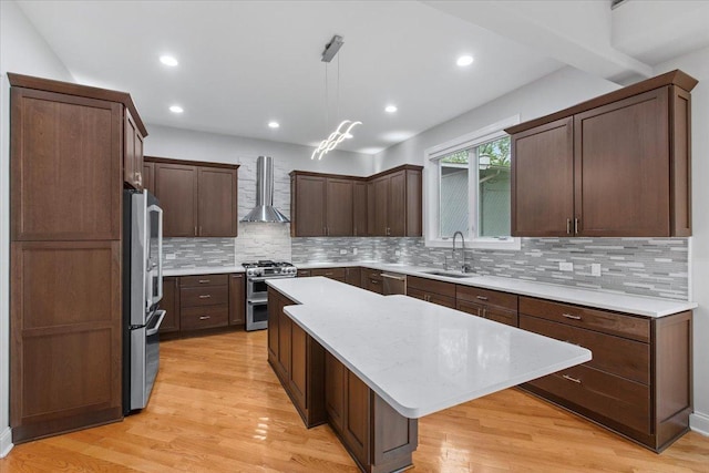 3 Crestview Ter, Buffalo Grove, IL 60089 - kitchen with wall chimney exhaust hood, appliances with stainless steel finishes, a sink, a kitchen island, and backsplash
