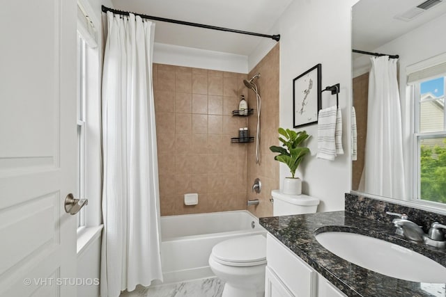 1263 Evergreen Ave, Des Plaines, IL 60016 - full bathroom featuring vanity, shower / tub combo, toilet, and marble finish floors
