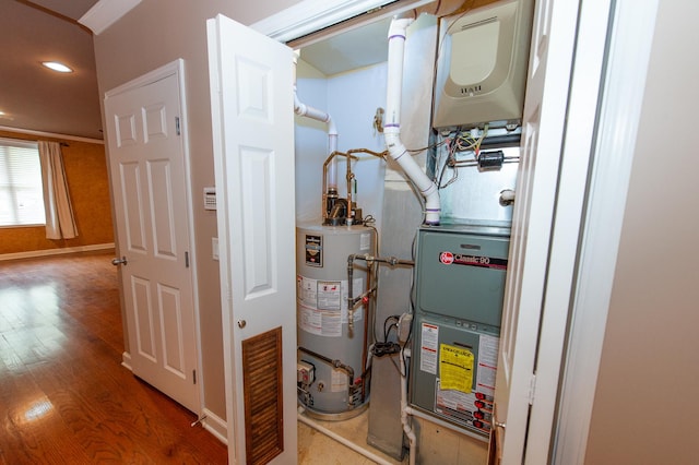 2612 W Diversey Ave Unit 101, Chicago, IL 60647 - utility room featuring gas water heater