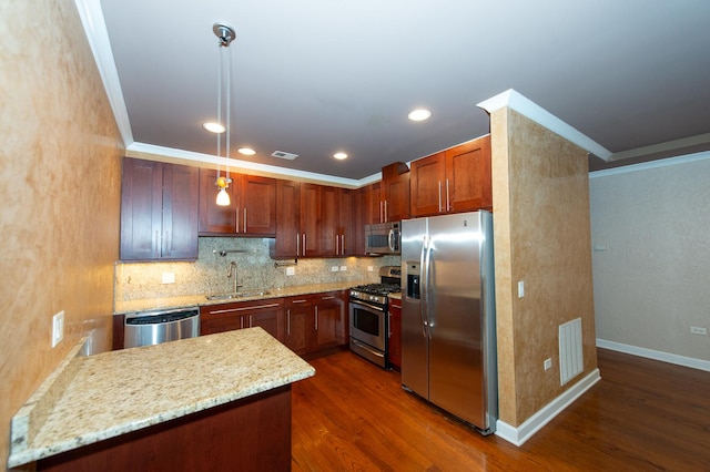 2612 W Diversey Ave Unit 101, Chicago, IL 60647 - kitchen with stainless steel appliances, a sink, crown molding, decorative backsplash, and dark wood-style floors