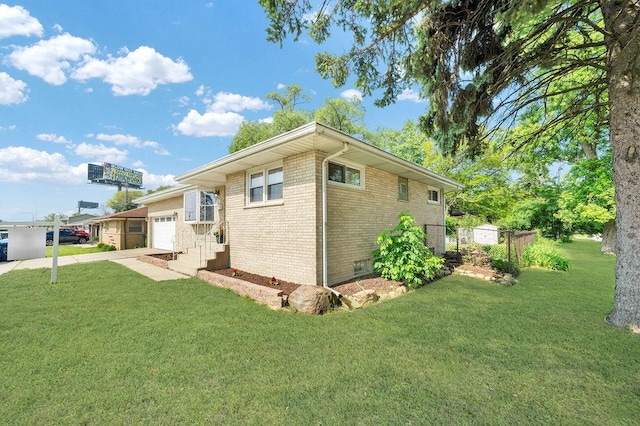 11400 S Ridgeland Ave, Worth, IL 60482 - view of property exterior featuring brick siding, a garage, and driveway