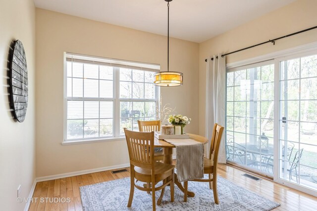 2831 Granite Ct, Crystal Lake, IL 60012 - dining area featuring baseboards and light wood-type flooring