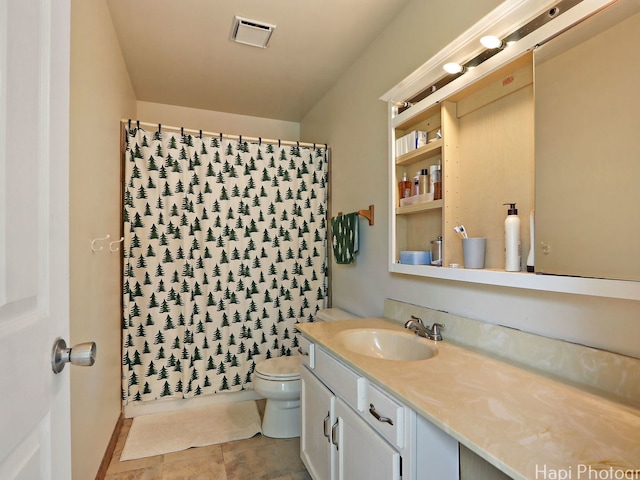 5501 Abbey Dr, Mchenry, IL 60050 - bathroom with vanity, toilet, and tile patterned flooring