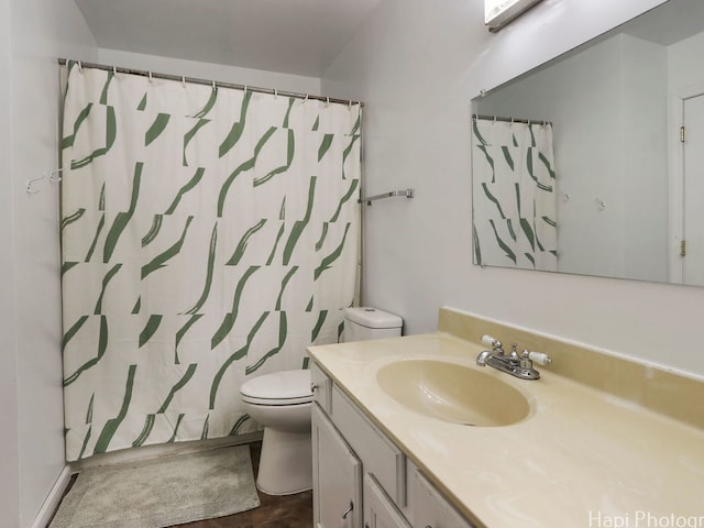 5501 Abbey Dr, Mchenry, IL 60050 - bathroom with vanity, toilet, and curtained shower