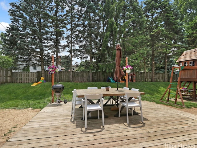 5501 Abbey Dr, Mchenry, IL 60050 - deck featuring a playground and outdoor dining space