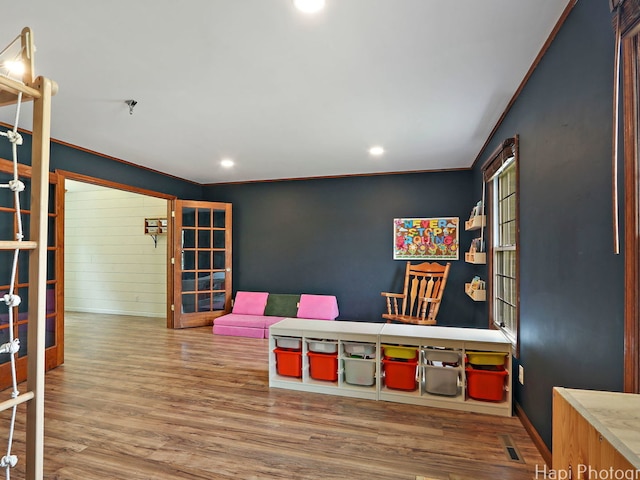 5501 Abbey Dr, Mchenry, IL 60050 - game room with wood finished floors, recessed lighting, baseboards, and crown molding