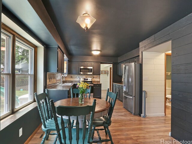 5501 Abbey Dr, Mchenry, IL 60050 - dining space featuring light wood-type flooring and baseboards