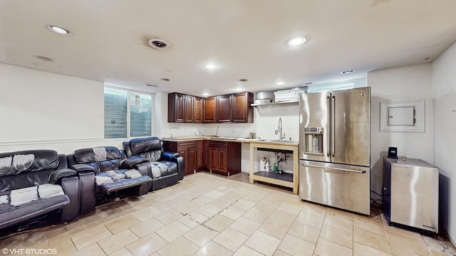 8N594 S Mclean Blvd, South Elgin, IL 60177 - kitchen with stainless steel fridge, light countertops, open floor plan, recessed lighting, and dark brown cabinetry