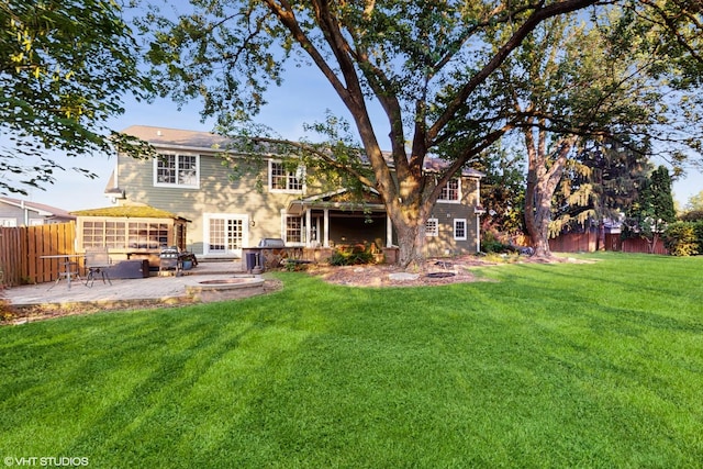 8N594 S Mclean Blvd, South Elgin, IL 60177 - rear view of property featuring a patio and a fire pit