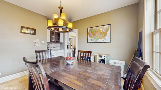 8N594 S Mclean Blvd, South Elgin, IL 60177 - dining space with a chandelier and light tile patterned flooring