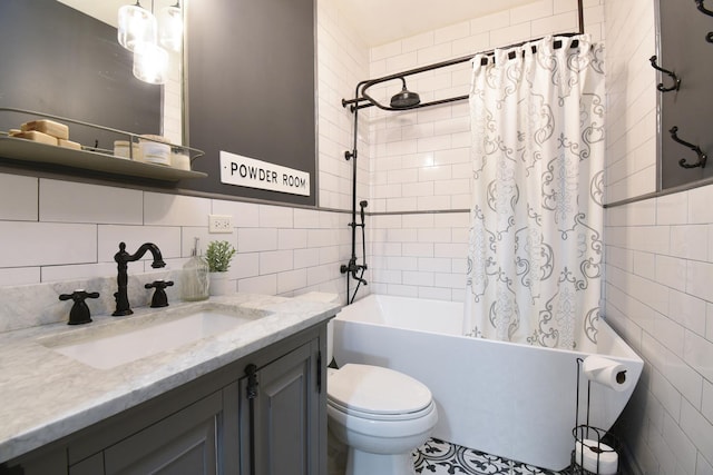 4419 N Racine Ave Unit 1N, Chicago, IL 60640 - bathroom featuring tile walls, shower / bath combo, toilet, and vanity