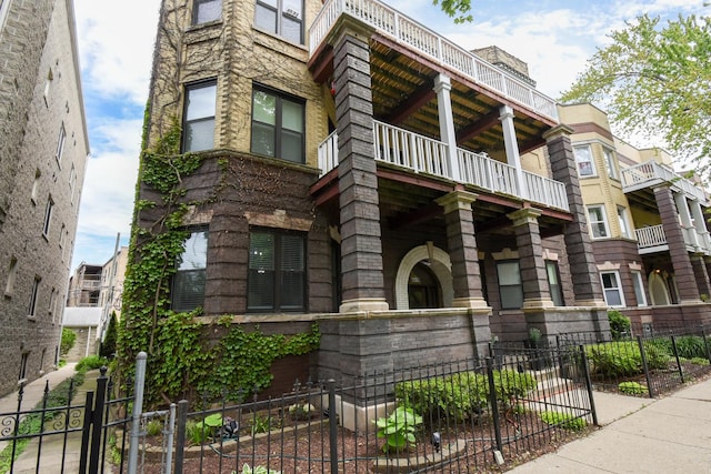 4419 N Racine Ave Unit 1N, Chicago, IL 60640 - view of front of property featuring a fenced front yard and a gate