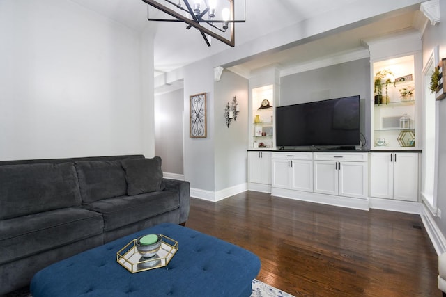 4419 N Racine Ave Unit 1N, Chicago, IL 60640 - living room featuring a chandelier, dark wood-style floors, baseboards, and built in features