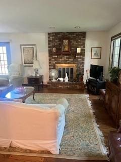 3824 Grove Ave, Western Springs, IL 60558 - living room with plenty of natural light, a brick fireplace, and wood finished floors