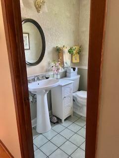 3824 Grove Ave, Western Springs, IL 60558 - bathroom featuring toilet and tile patterned floors