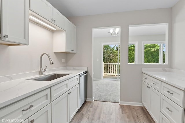 0N111 Windermere Rd Unit 2107, Winfield, IL 60190 - kitchen featuring a sink, dishwasher, light wood finished floors, white cabinetry, and light stone countertops