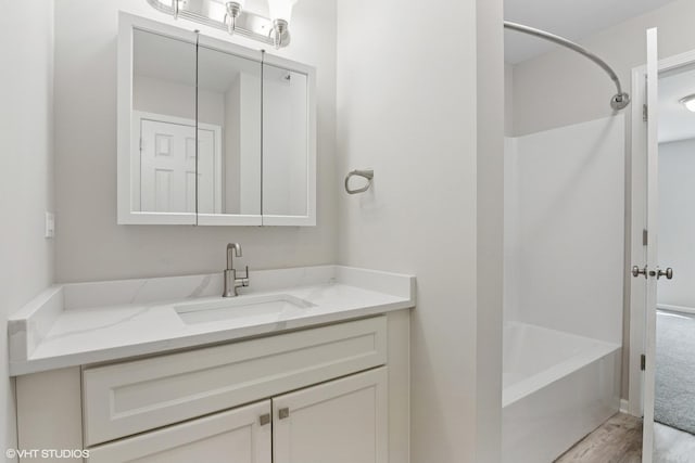 0N111 Windermere Rd Unit 2107, Winfield, IL 60190 - full bathroom featuring vanity, wood finished floors, and shower / bath combination