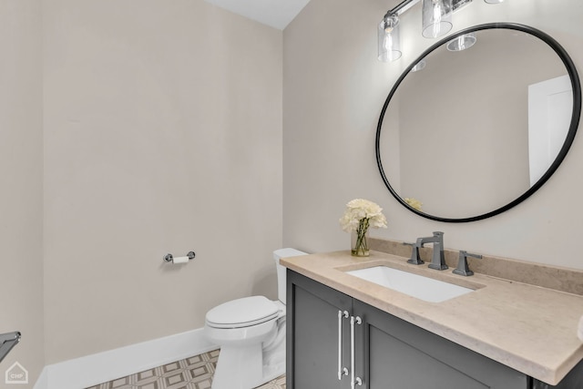 4920 Stonewall Ave, Downers Grove, IL 60515 - half bath with vanity, toilet, and baseboards