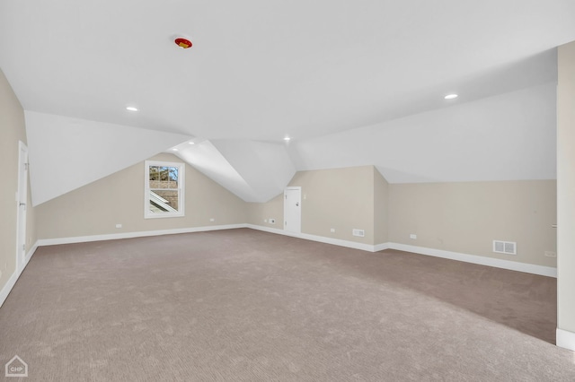 4920 Stonewall Ave, Downers Grove, IL 60515 - additional living space featuring vaulted ceiling, carpet flooring, baseboards, and recessed lighting